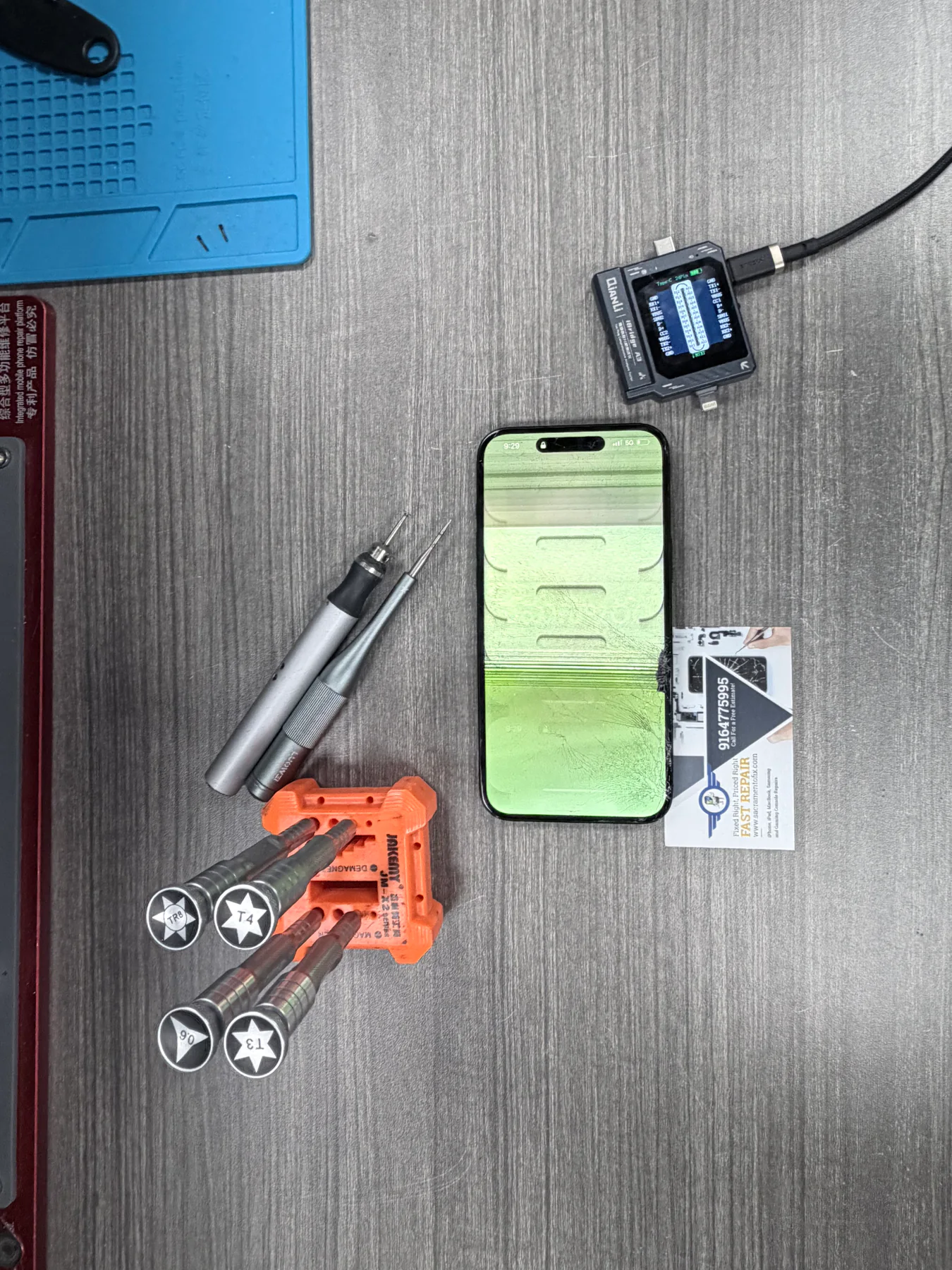 iPhone 16 Plus showing green lines and display damage before repair