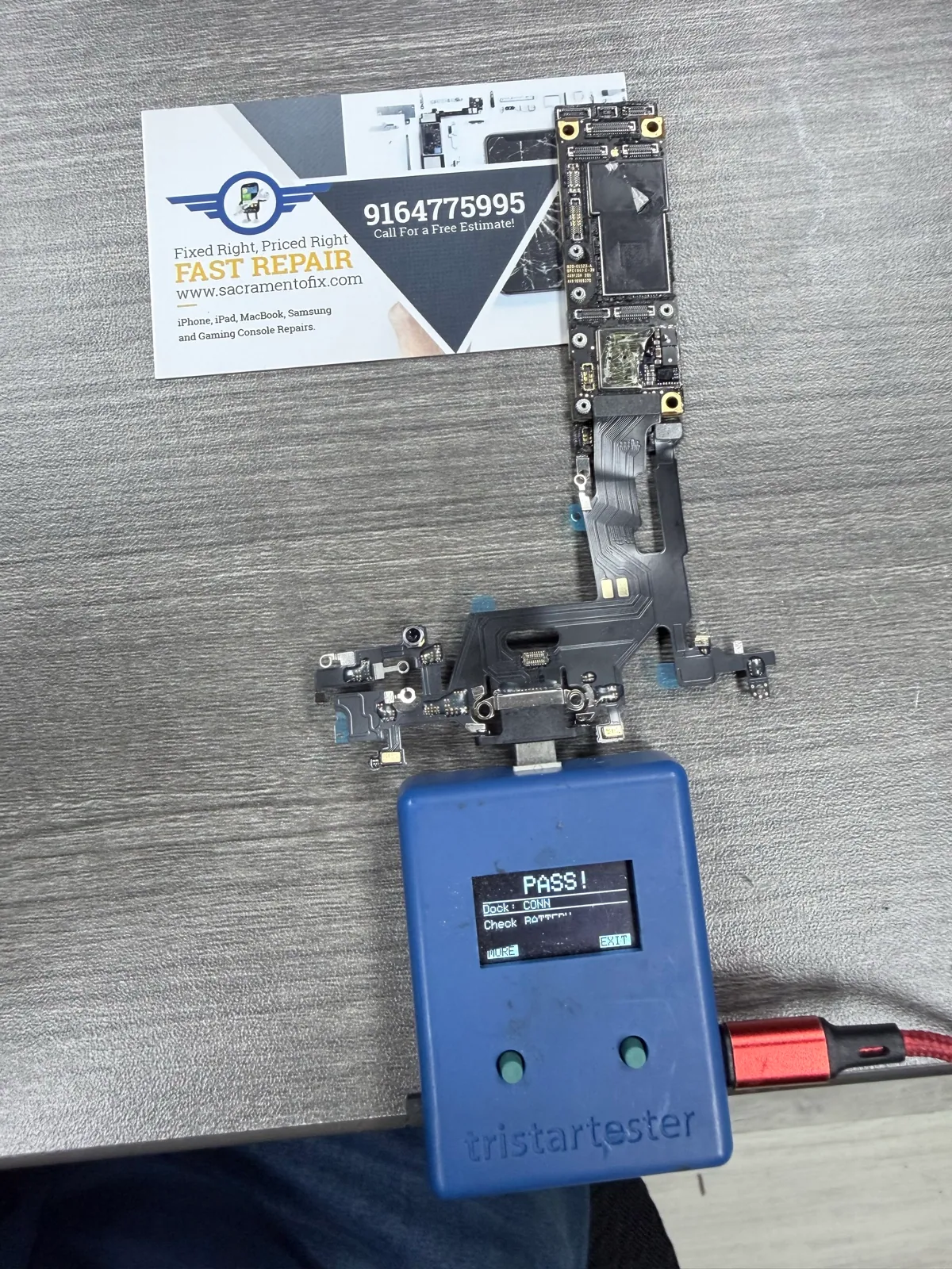 TriStar tester showing pass after iPhone 11 charging IC repair in Sacramento